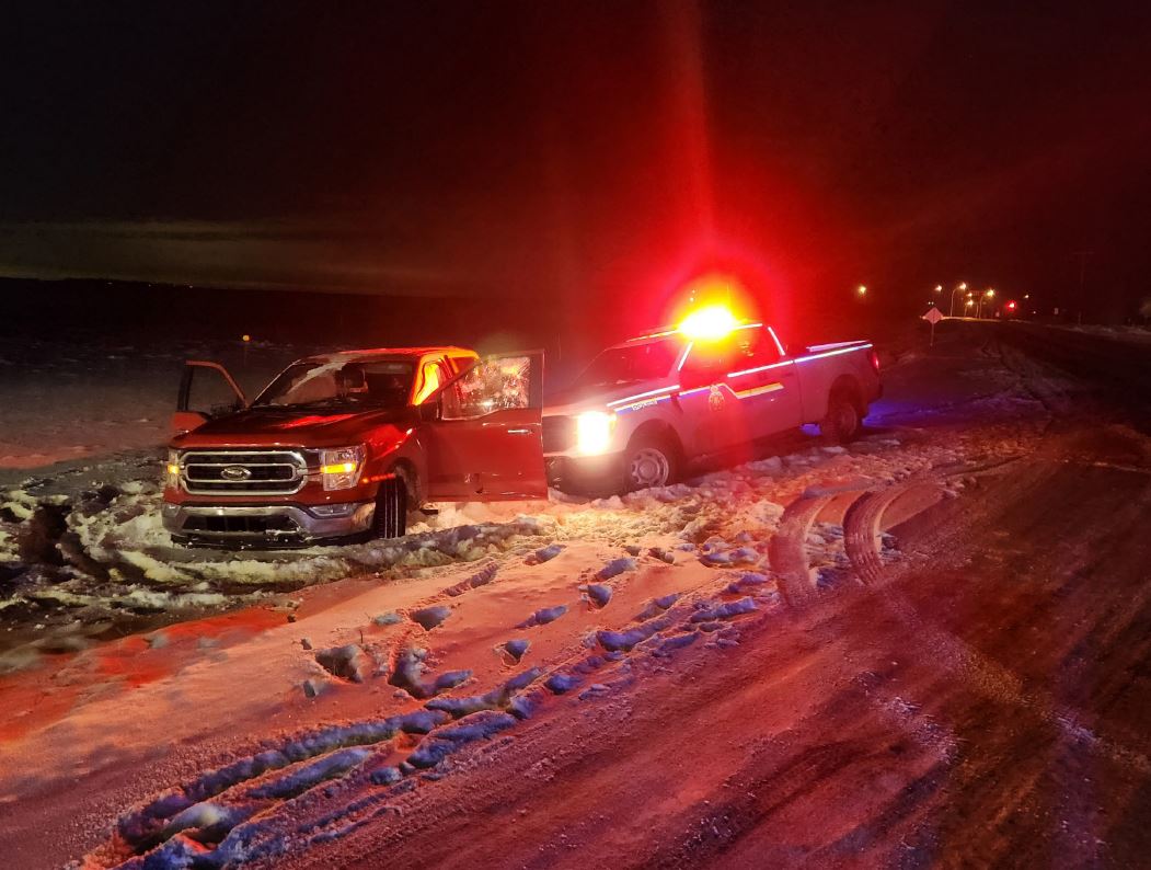 RCMP near Morinville, Alta. said they had to use a police vehicle to stop a truck Wednesday, after the driver struck a police vehicle and assaulted an officer on a highway north of Edmonton.