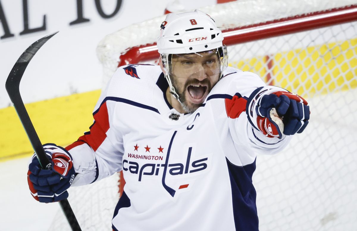 Washington Capitals forward Alex Ovechkin (8) celebrates his goal during second period NHL hockey action against the Calgary Flames in Calgary, Alta., Monday, March 18, 2024.