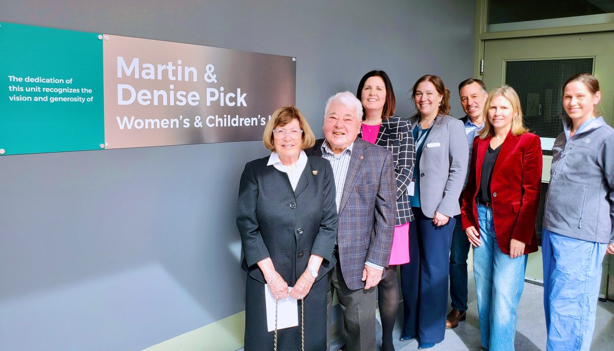 ictured in the Peterborough Regional Health Centre Women’s & Children’s Unit with new signage honouring Martin and Denise Pick are from left to right Denise Pick, Martin Pick, PRHC Foundation President & CEO Lesley Heighway, PRHC President & CEO Dr. Lynn Mikula, Denise and Martin’s son Charles Pick, their daughter-in-law Dr. Rardi Van Heest, and PRHC General Surgeon Dr. Joslin Cheverie.