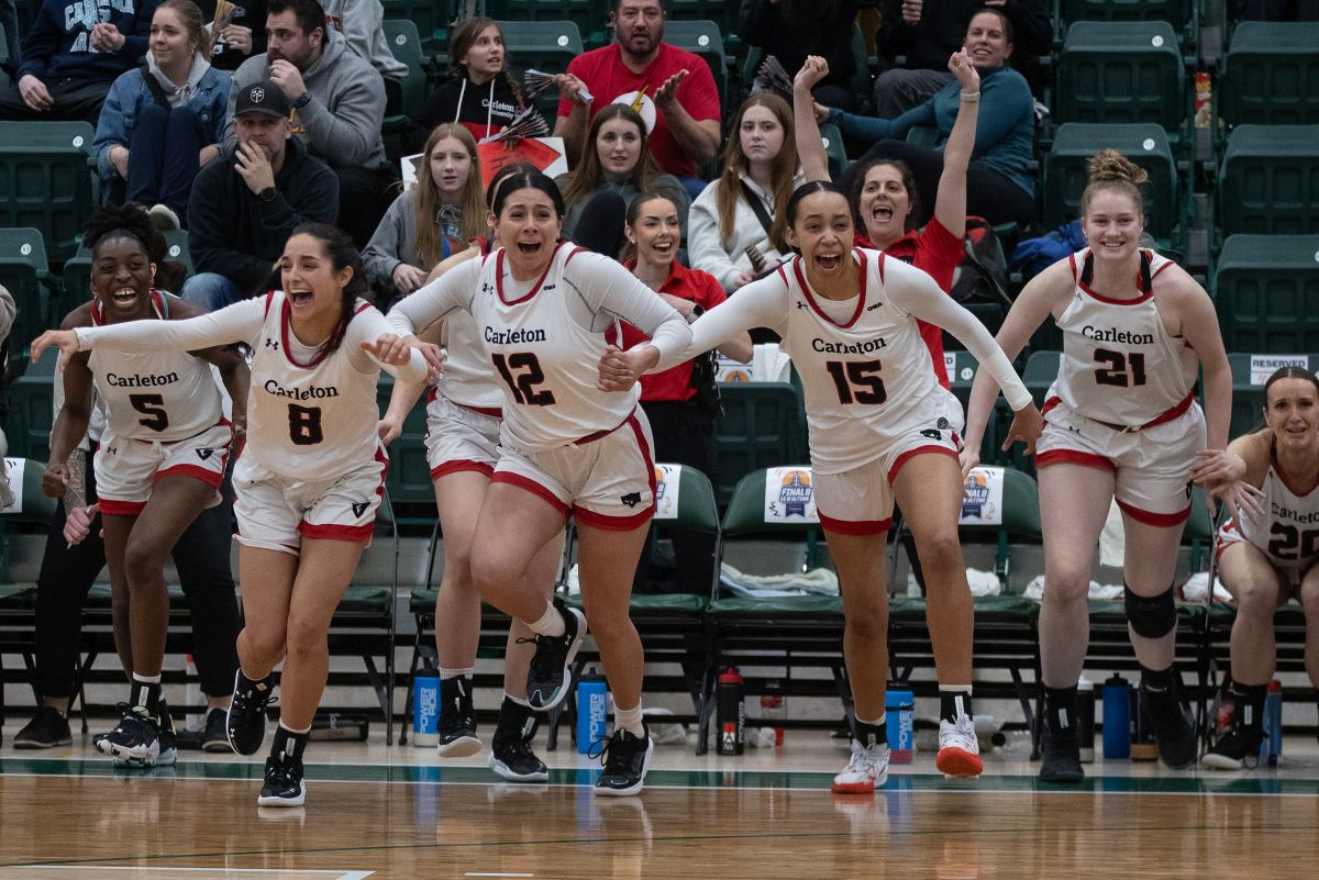 Carleton Ravens celebrate the win over the University of Saskatchewan Huskies during the final U Sports Women's Final 8 Basketball Championship, in Edmonton, Sunday, March 10, 2024.