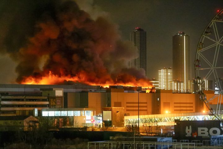 A massive blaze is seen at a concert hall on the western edge of Moscow, Russia, on Friday, March 22, 2024 where a deadly attack reportedly occurred.