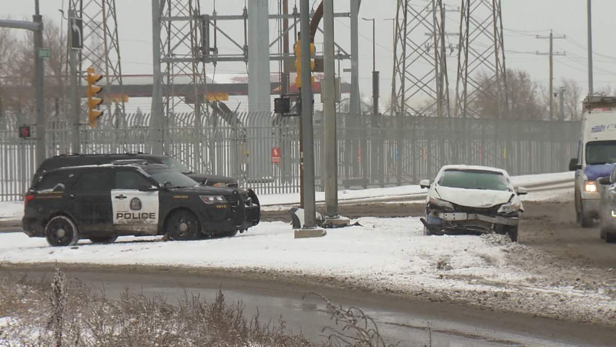 Calgary police attend to a collision in Calgary on March 20, 2024.