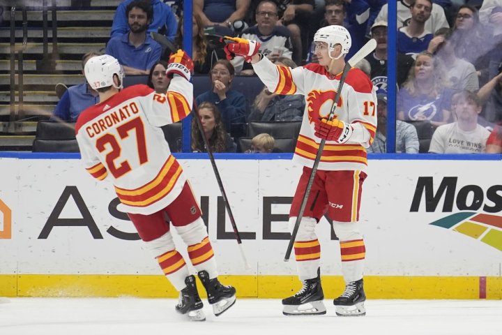 Sharangovich has 4 points as Flames beat Lightning 6-3