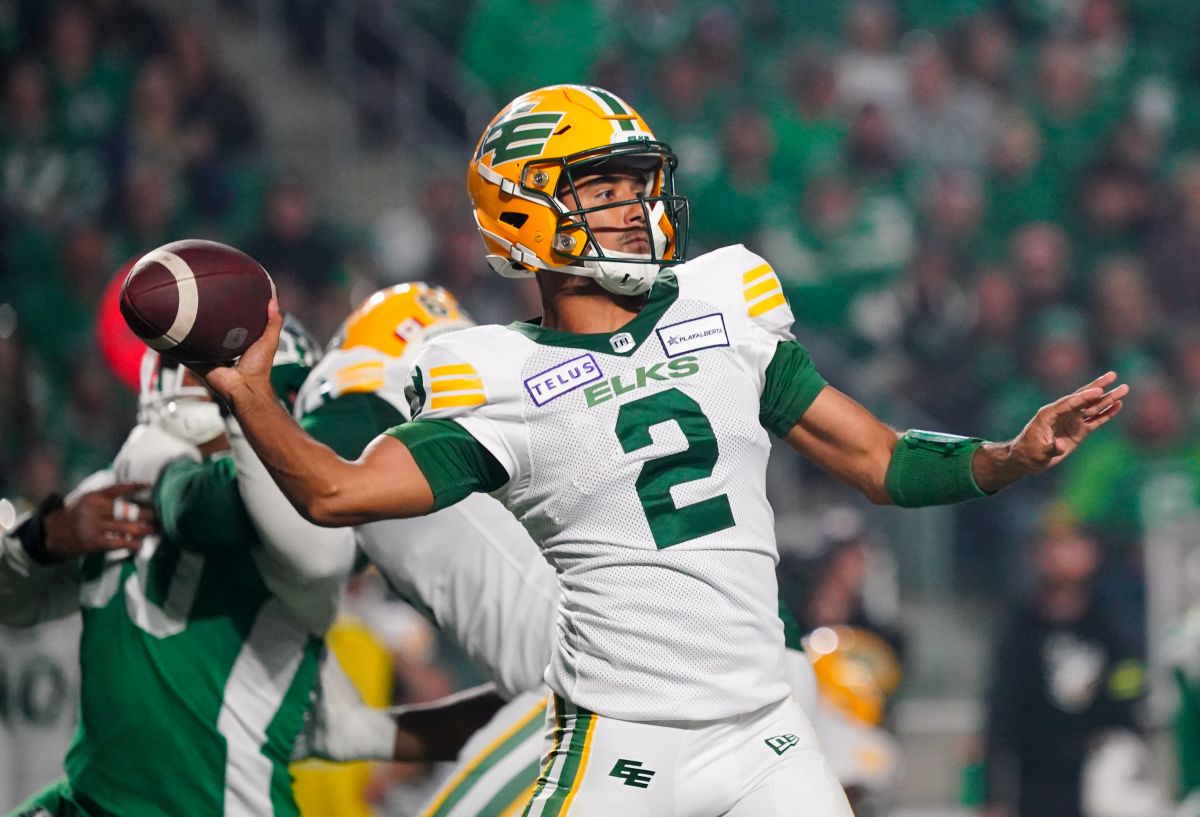 Edmonton Elks quarterback Tre Ford (2) throws against Saskatchewan Roughriders during the first half of CFL football action in Regina, on Friday, September 15, 2023.