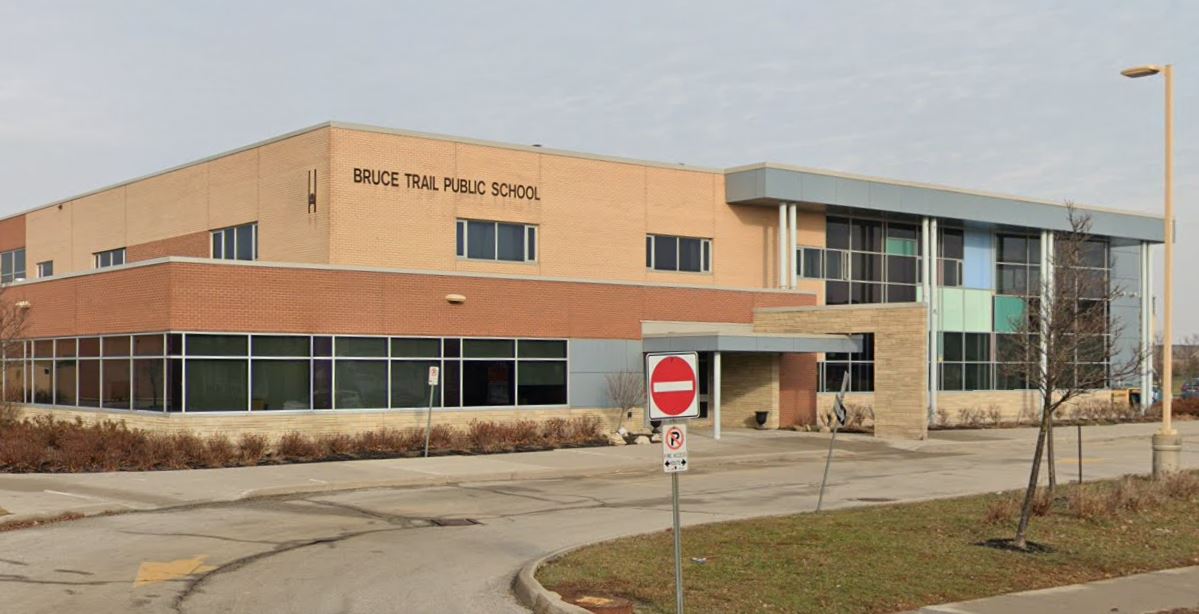 An image of the front of a public school.