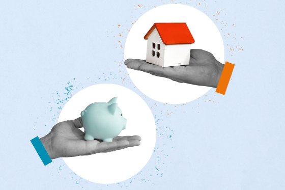 Hands holding piggy bank and house