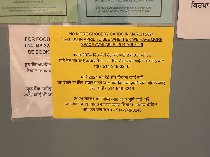 A multi-lingual sign at a Montreal food bank warns users that they can't give out that they can't take on any they are out of grocery cards for the month of March