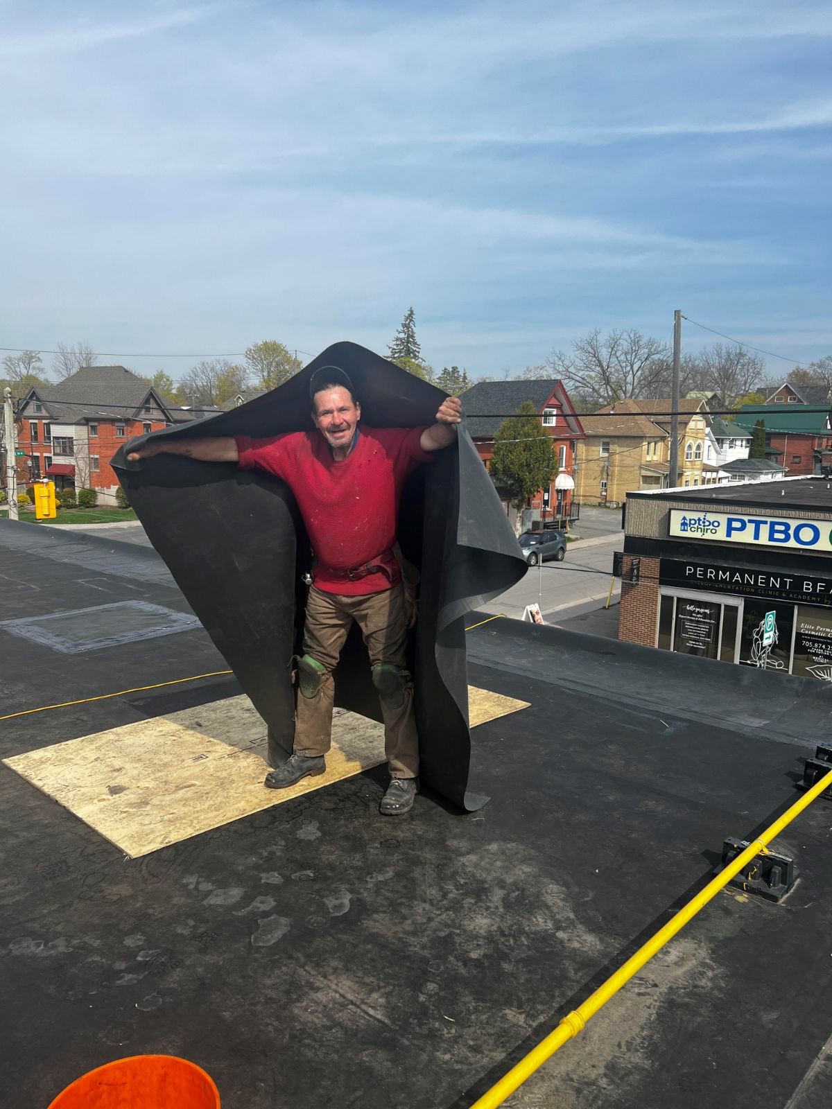 Gerry Prevost doing roofing.