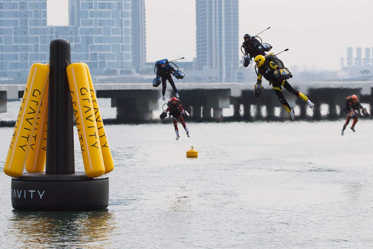 Jet suit pilots race in Dubai, United Arab Emirates, Wednesday, Feb. 28, 2024, in what might be the first-ever jet suit race. (AP Photo/Jon Gambrell)