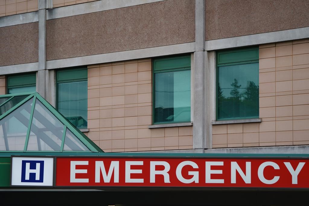 Seven people in Ontario have been fined for refusing transfers from a hospital to a long-term care home not of their choosing. The emergency sign of a Toronto hospital is photographed on Tuesday, Sept. 27, 2022. 