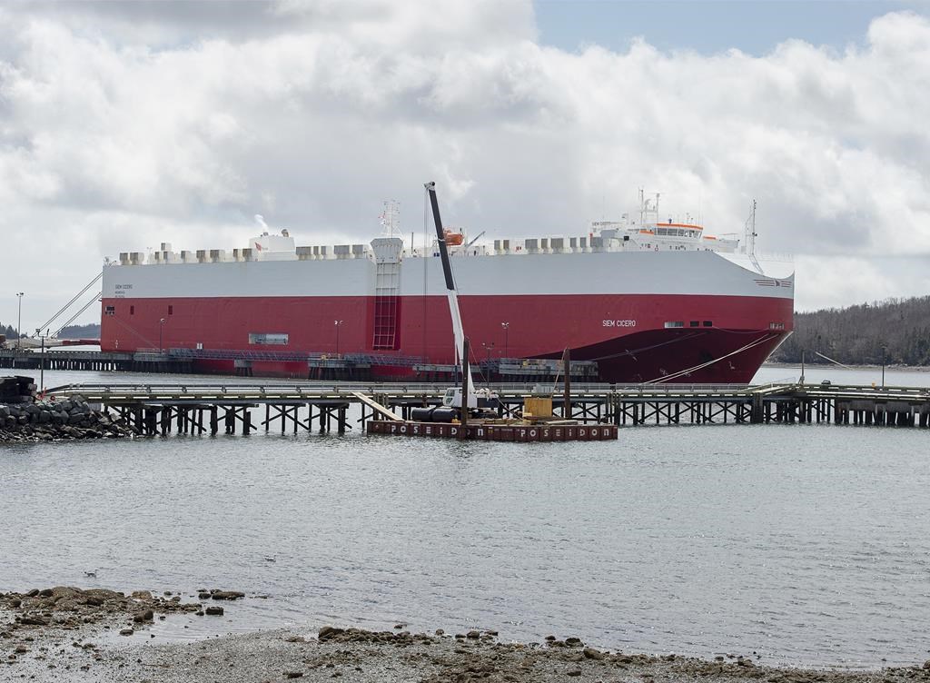 The auto carrier Siem Cicero is docked at the Autoport in Eastern Passage, N.S. on Monday, April 6, 2020. A weeks-long strike at a transshipment facility near Halifax is over after union members ratified a three-year collective agreement. THE CANADIAN PRESS/Andrew Vaughan.