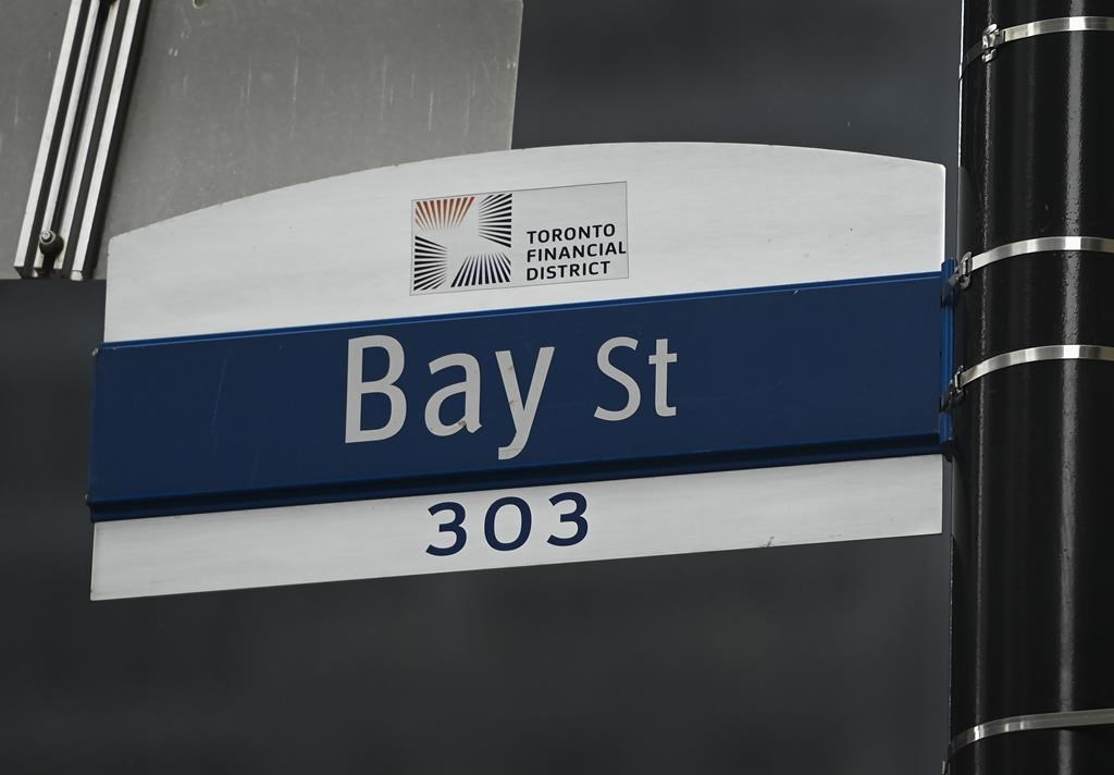 A street sign along Bay Street in Toronto's financial district is shown on Tuesday, Jan. 12, 2021. THE CANADIAN PRESS/Nathan Denette.