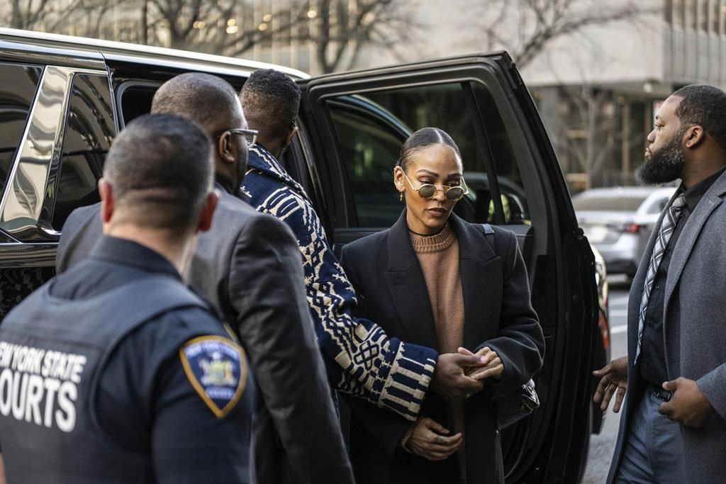 Jonathan Majors and Meagan Good arrive at Criminal Court on Monday, April 8, 2024 in New York.