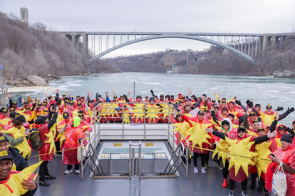 A bunch of people dressed up as the sun in Niagara Falls and broke a Guinness record