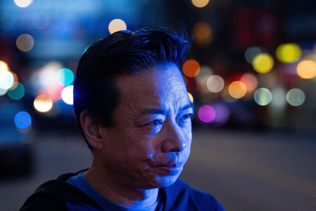 Vancouver Mayor Ken Sim speaks about a shooting incident in Vancouver, Saturday, March. 30, 2024. Twelve municipal political parties in British Columbia, including those that won council majorities in Vancouver and Burnaby in 2022, are under investigation by Elections BC for possible financing or advertising violations. THE CANADIAN PRESS/Ethan Cairns.