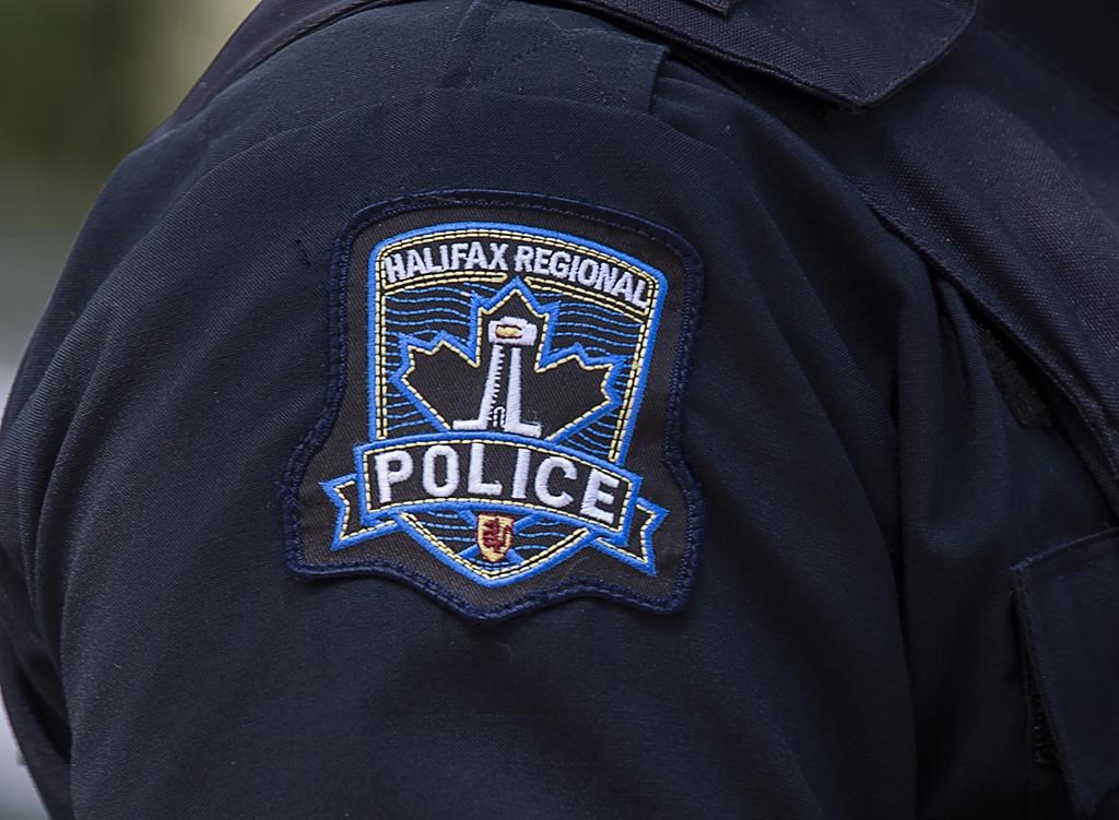 Police in downtown Halifax arrested 21 protesters Monday after they blocked traffic during a demonstration about the war between Israel and Hamas in the Gaza Strip. A Halifax Regional Police emblem is seen on a police officer in Halifax on July 2, 2020. THE CANADIAN PRESS/Andrew Vaughan.