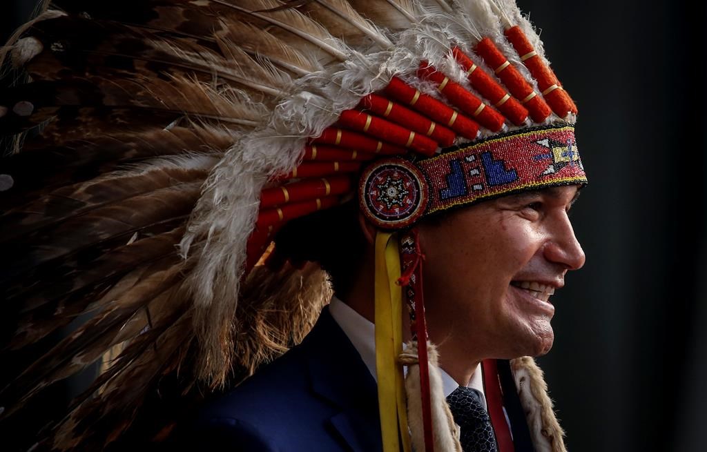 Manitoba Premier Wab Kinew speaks at a premier and cabinet swearing-in ceremony in Winnipeg on Wednesday, Oct. 18, 2023. New figures show Manitoba New Democrats raised and spent more money than the Progressive Conservatives in last year's election campaign.