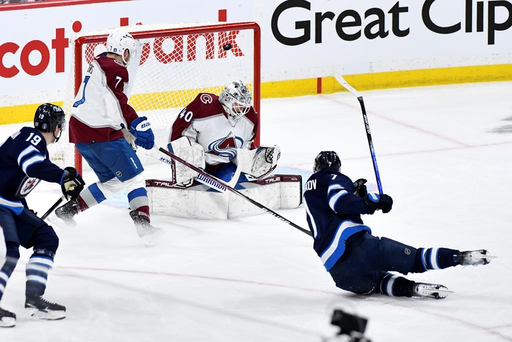Winnipeg Jets’ Vladislav Namestnikov (7) scores on Colorado Avalanche goaltender Alexandar Georgiev (40) during the first period in Game 1 of their NHL hockey Stanley Cup first-round playoff series in Winnipeg on Sunday April 21, 2024.