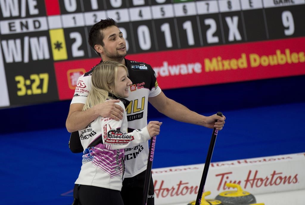 Kadriana and Colton Lott celebrate during the Canadian Mixed Double Curling Championship Calgary on Wednesday, March 24, 2021. The pair are on the verge of lcoking up a playoff spot at the world mixed doubles curling championship after posting a 10-4 win over China on Wednesday.THE CANADIAN PRESS/HO - Curling Canada, Michael Burns.