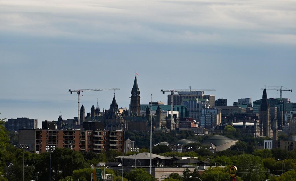 Parliament Hill and the Ottawa skyline are seen from a vantage point in Gatineau, Que., Monday, Sept. 5, 2022. 
