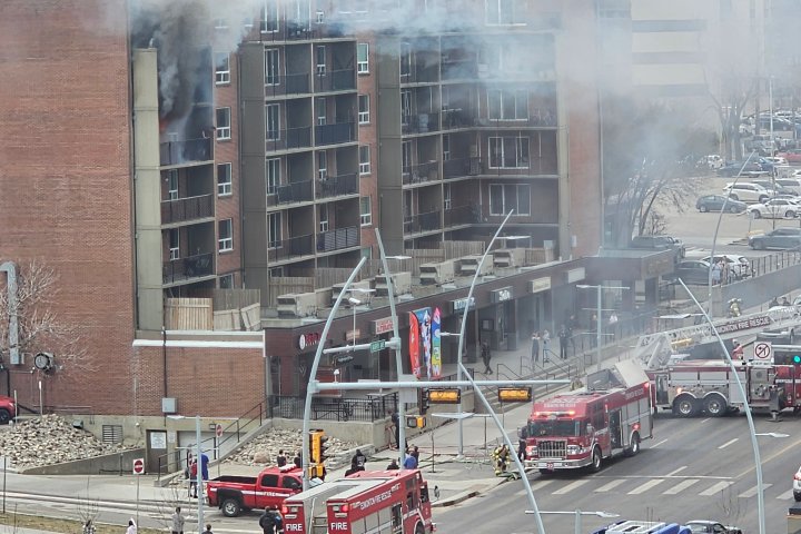 Person rescued from fiery balcony as Edmonton crews battle Jasper Avenue fire