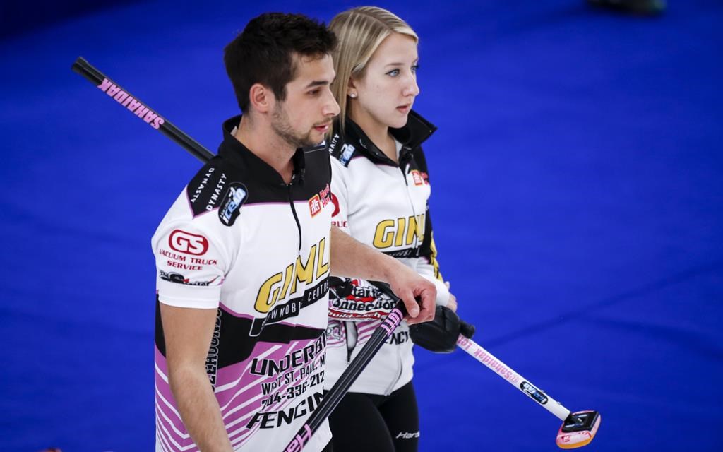 Kadriana and Colton Lott discuss strategy at the Canadian Mixed Doubles Curling Championship in Calgary, Wednesday, March 24, 2021. The team was ousted from the world mixed doubles curling championship after suffering a 6-5 loss to Estonia in a playoff qualification game on Friday.THE CANADIAN PRESS/Jeff McIntosh.