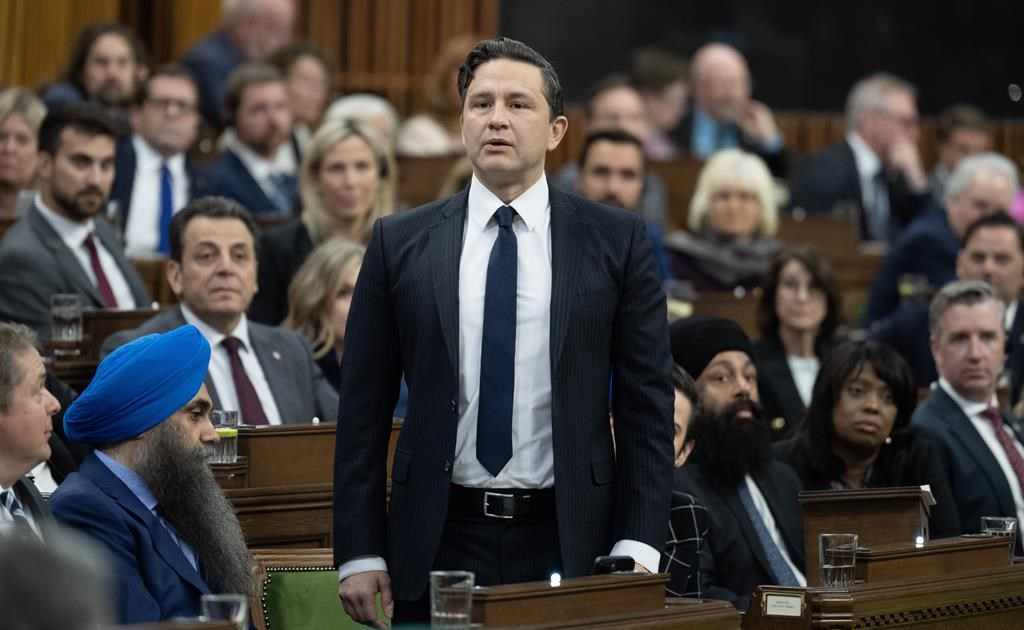 Leader of the Conservative Party Pierre Poilievre rises in response to the Speaker asking him to withdraw language during question period, Tuesday, April 30, 2024 in Ottawa.