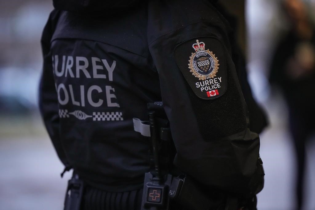 A Surrey police department logo is seen on an officer's jacket in Surrey, B.C., Monday, Oct. 31, 2022.