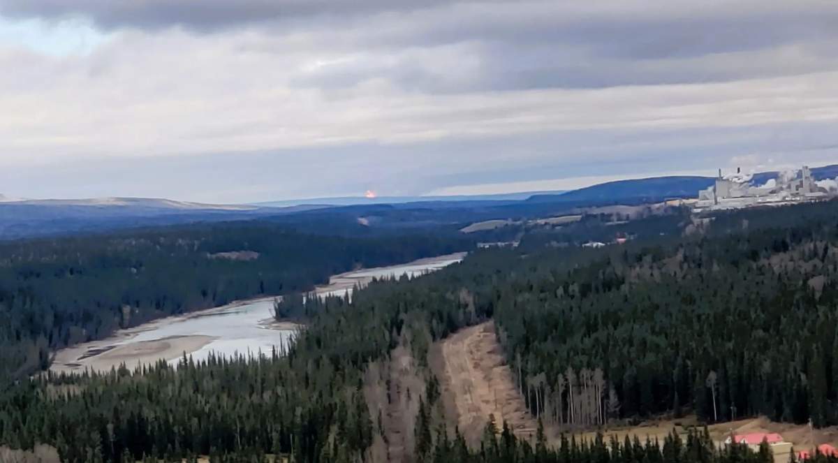 A pipeline fire seen on the horizon in Yellowhead County on Tuesday, April 16, 2024.