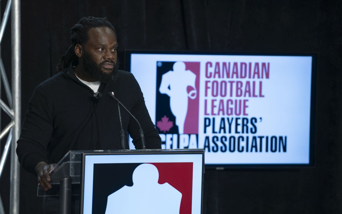 Solomon Elimimian, President, Canadian Football League Players Association (CFLPA) speaks to media to deliver the union’s State of the Union with Brian Ramsay, Executive Director, CFLPA, in Hamilton, Ont. on Tuesday, November 14, 2023.