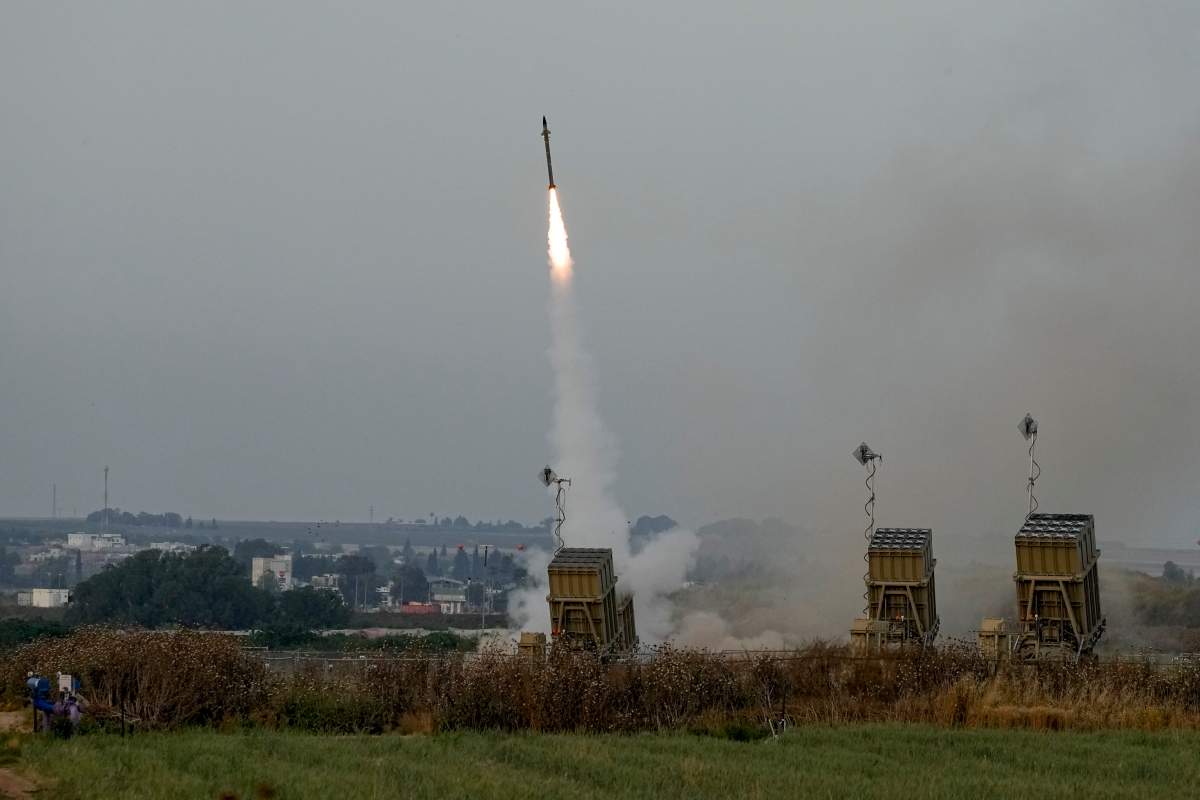 Israel’s Iron Dome anti-missile system fires to intercept a rocket launched from the Gaza Strip towards Israel, near Sderot, Israel, Thursday, May 11, 2023.