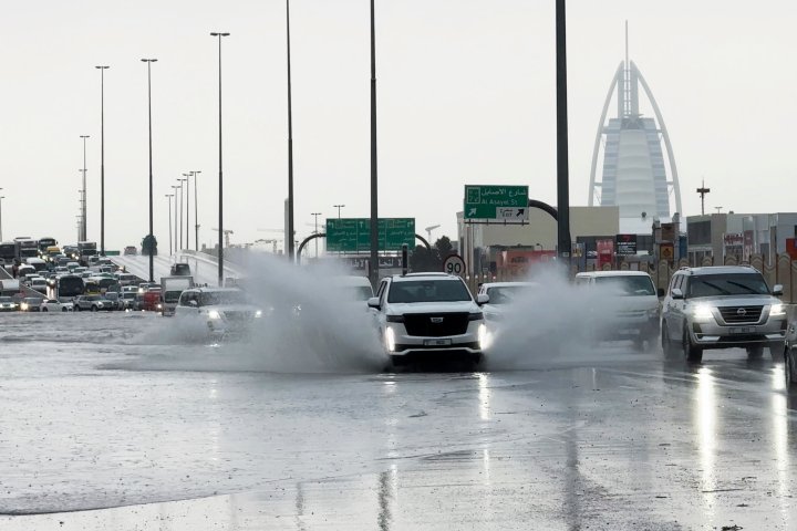 Dubai airport diverts flights as heavy rains flood runway, roads