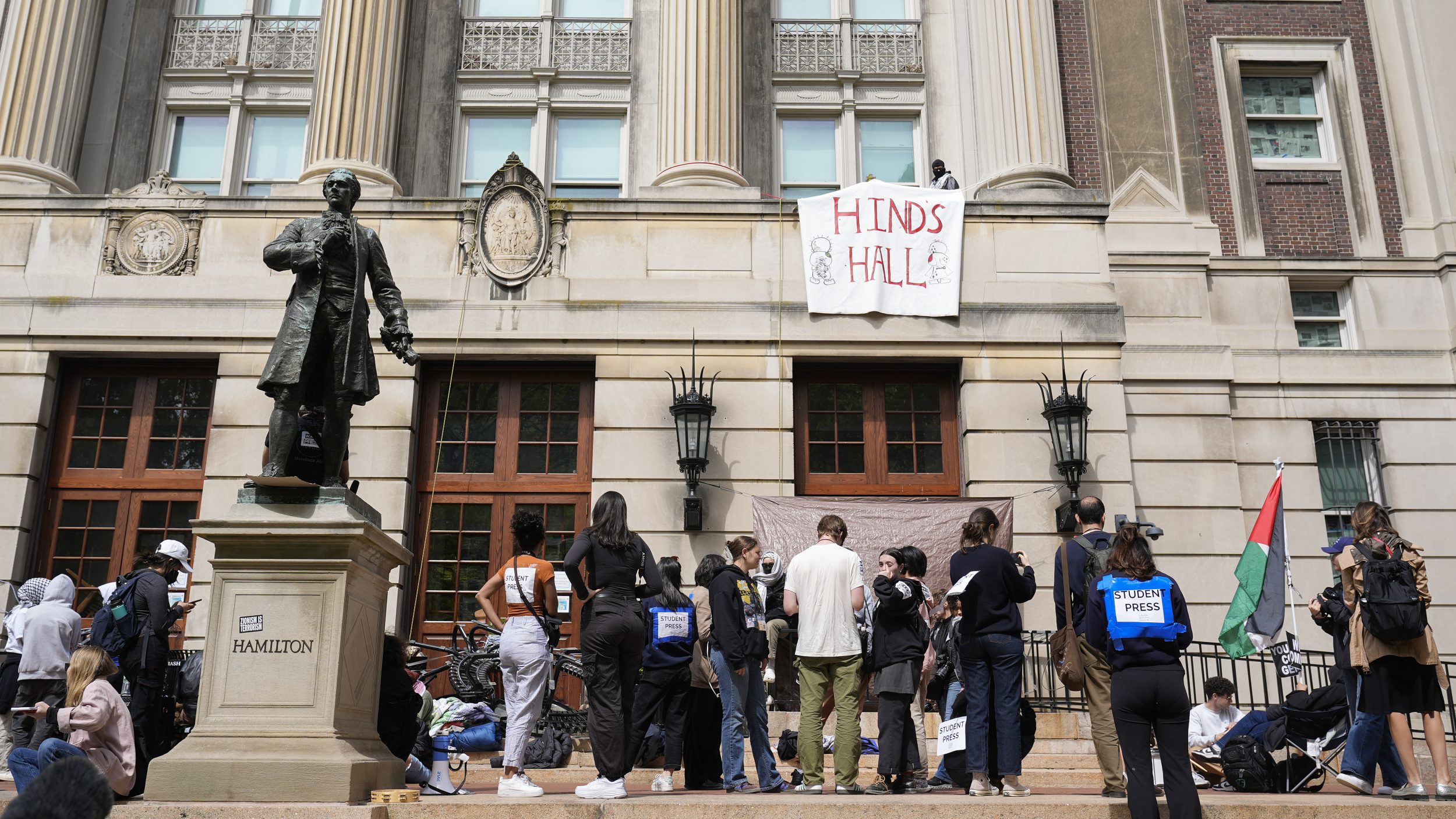 Columbia student protesters face expulsion after taking over campus
building