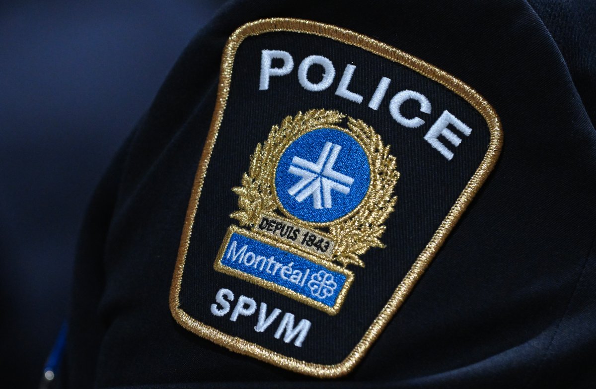 An SPVM Montreal police badge is shown during a news conference in Montreal,