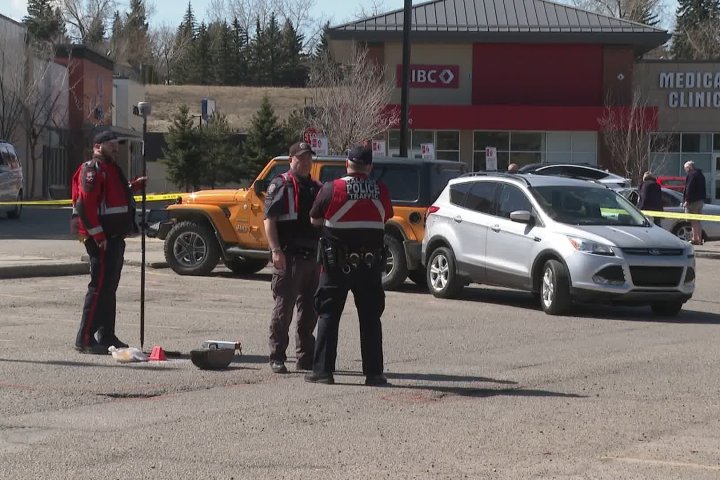 Senior in life-threatening condition after being hit by her own vehicle in Calgary parking lot