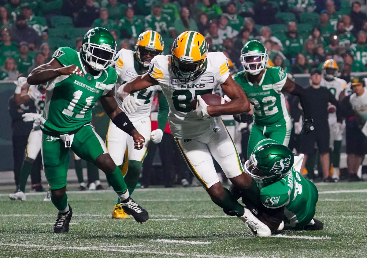 Edmonton Elks receiver Eugene Lewis (87) runs the football against Saskatchewan Roughriders during the first half of CFL football action in Regina, on Friday, September 15, 2023.