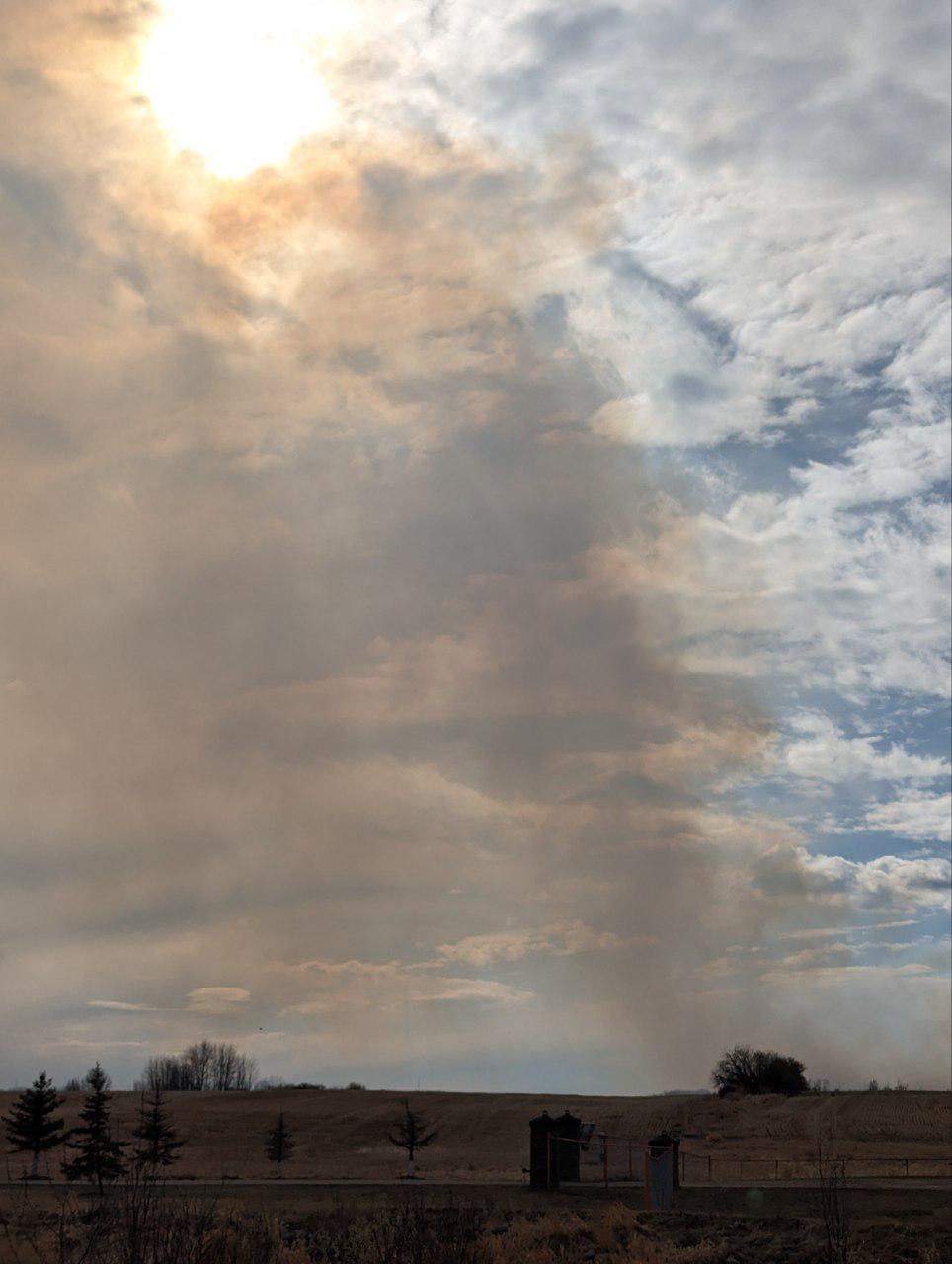 A grass fire south of Edmonton as seen from the Orchards area on Thursday, April 25, 2024.