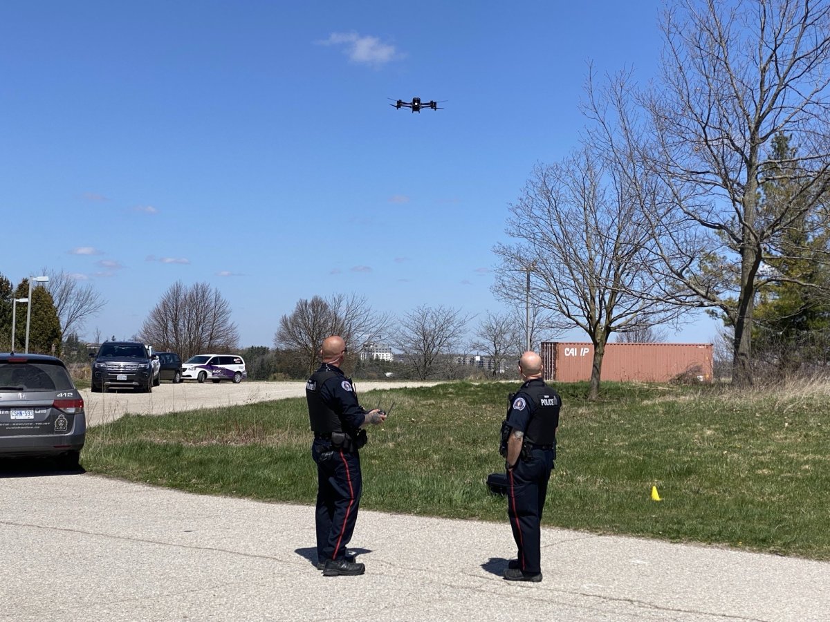 Members of the Guelph police RPAS team demonstrate the drone at the former Turfgrass Institute.