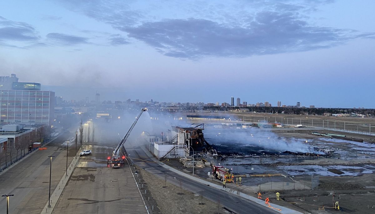 A view of Hangar 11 in Edmonton on April 23, 2024, the day after a massive fire. The structure is situated between the NAIT campus and the Blatchford neighbourhood, alongside what used to be Edmonton's City Centre Airport.