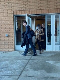 Taylor Kennedy walks out of Saskatoon Provincial Court Friday, April 19, 2024, behind her defence lawyer Thomas Hynes. Kennedy is on trial for THC-impaired driving causing the death of nine-year-old Baeleigh Maurice. 