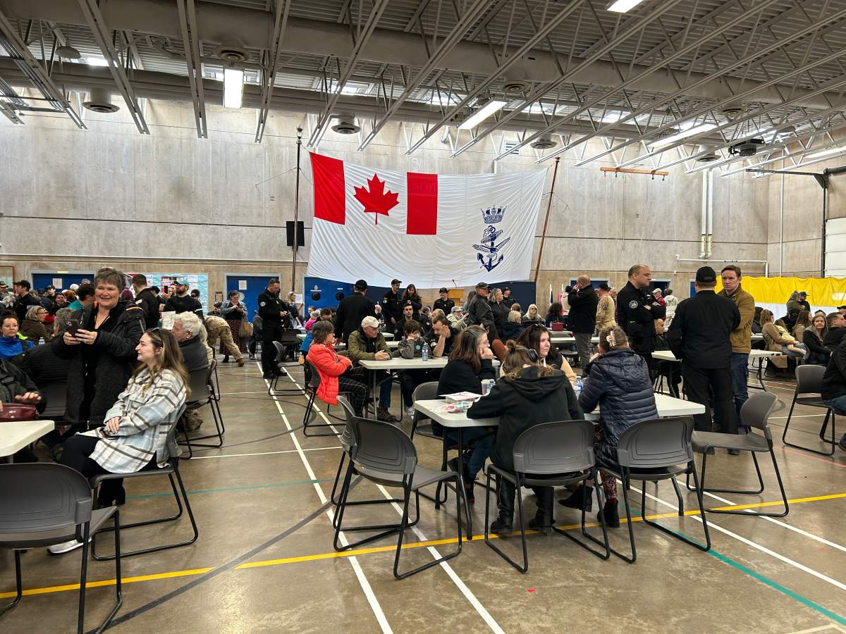 Families gather alongside Royal Canadian Navy members in Halifax before crew members boarded HMCS Montreal ahead of a six-month deployment to the Indo-Pacific region.