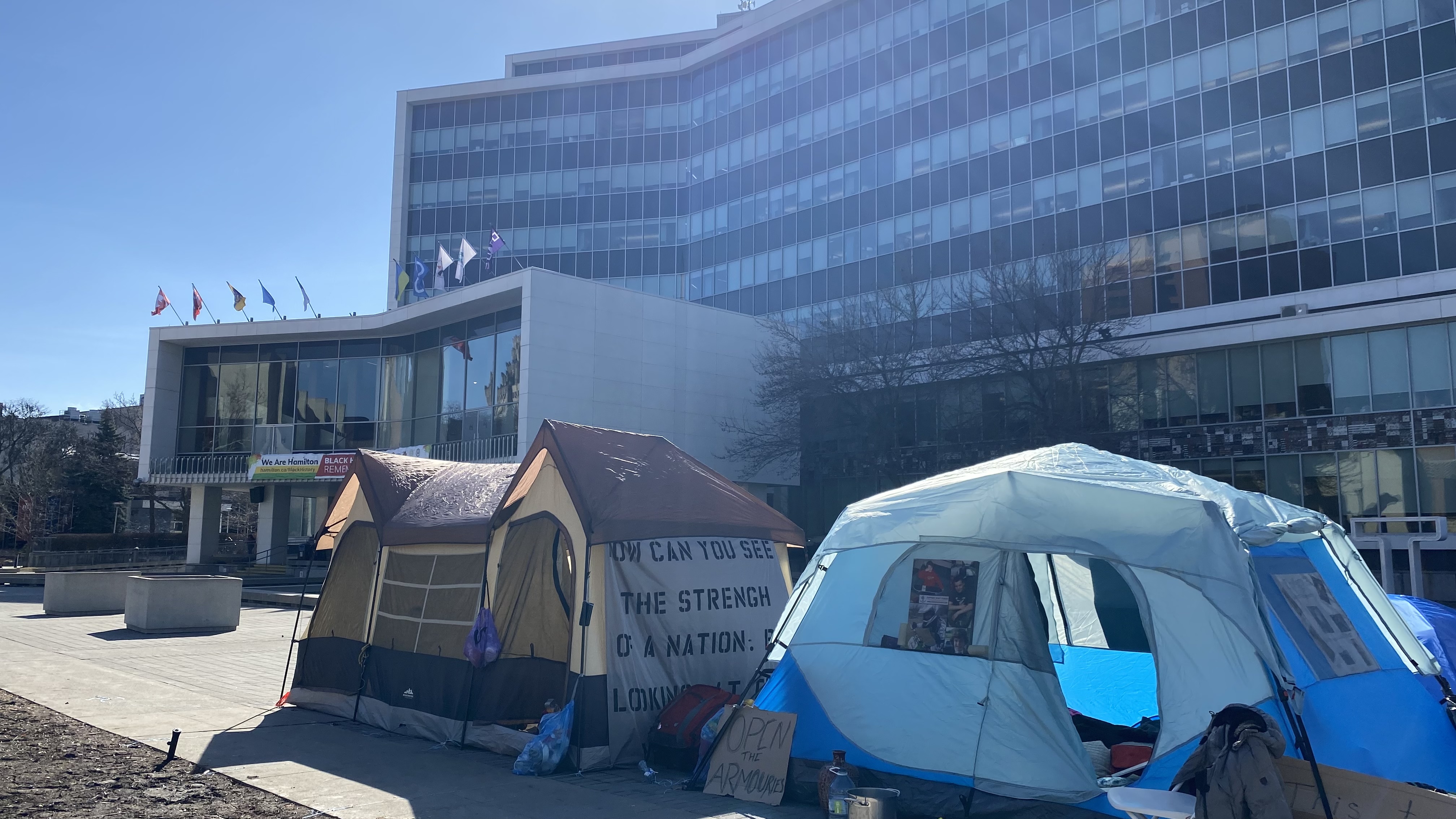City hall encampment shrinks as Hamilton uses outreach, notices to relocate unhoused