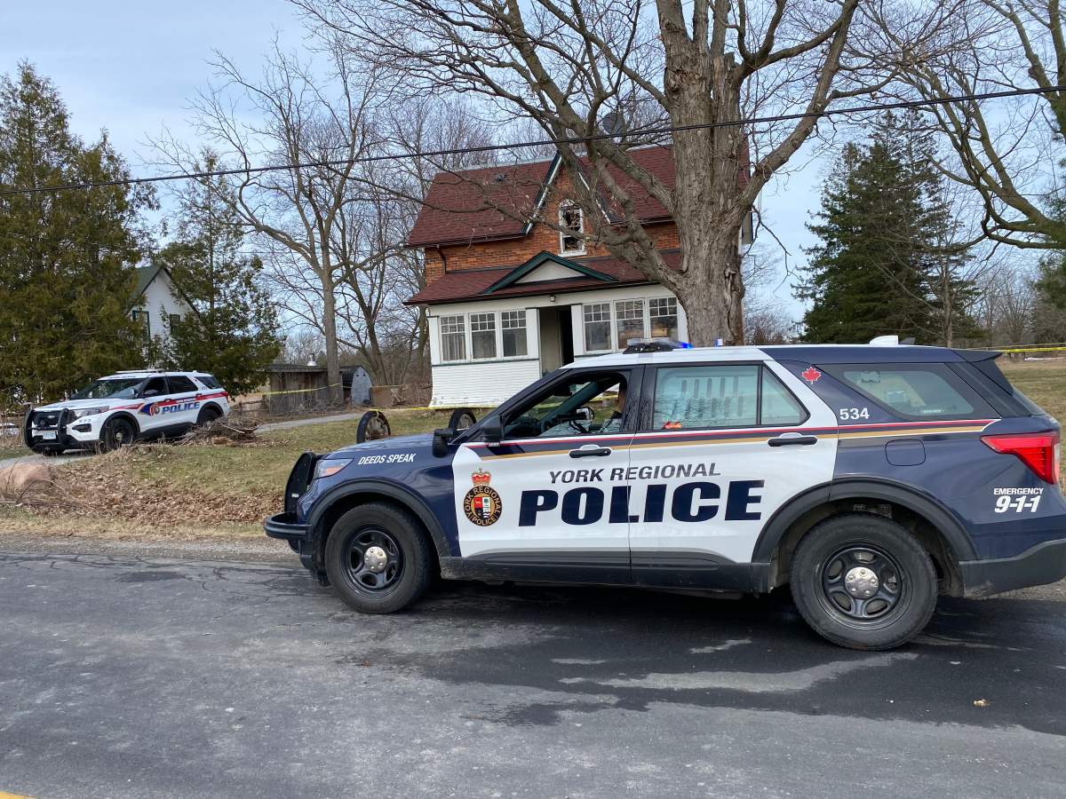 A police car on the scene of a fire in a rural area of Markham, Ont., on April 1, 2024.