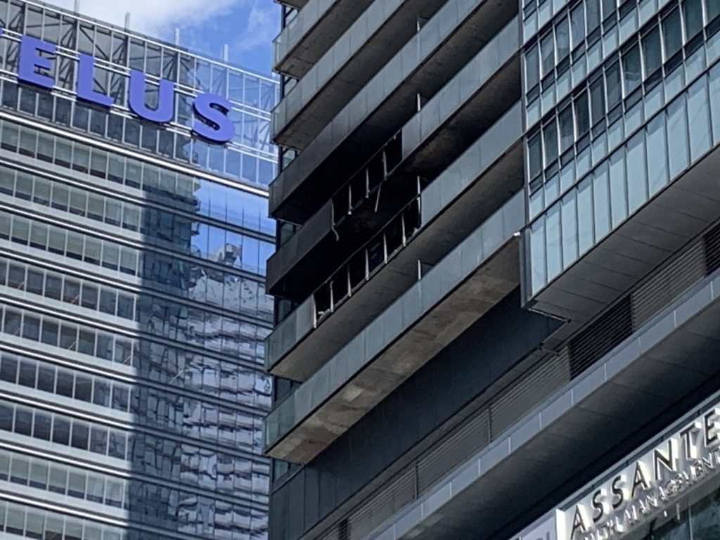 Toronto fire crews have extinguished a two-alarm fire at a condo building in the Maple Leaf Square area on Monday afternoon.