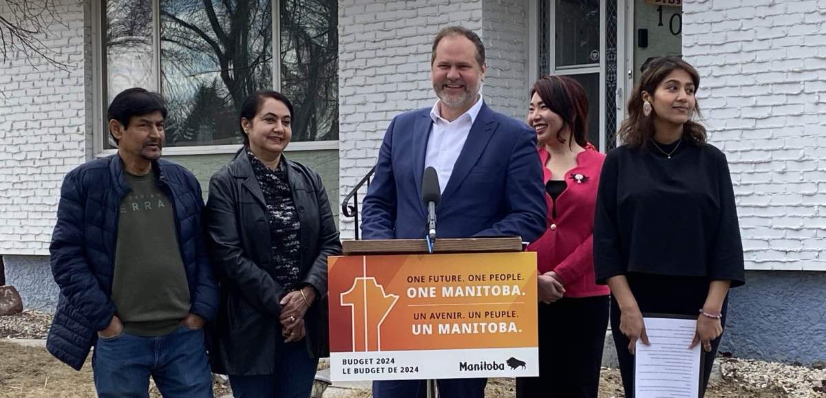 Manitoba justice minister Matt Wiebe met with Winnipeg homeowners April 15 to announce a security rebate.