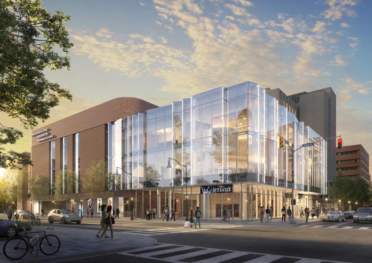 A rendering of a building with big, multiple-storey glass windows and brick. A sign says, "The Nutcracker" and on the top left corner of the building it says, "Centre des Arts de la Scéne Fredericton Performing Arts Centre."