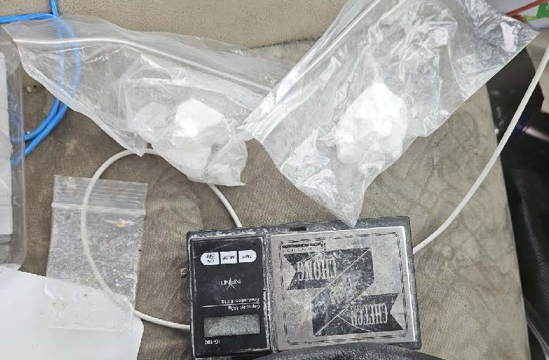 Contraband seized by Manitoba RCMP following the arrest of two suspects who crashed their vehicle in a ditch.