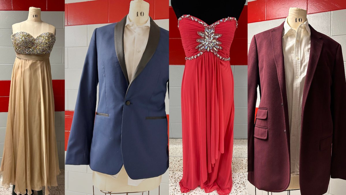Photo of Two prom dresses and a pair of mens jackets.