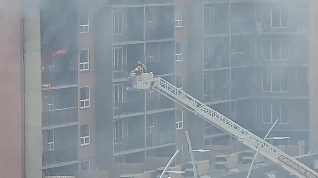 Person rescued from fiery balcony as Edmonton crews battle Jasper
Avenue fire