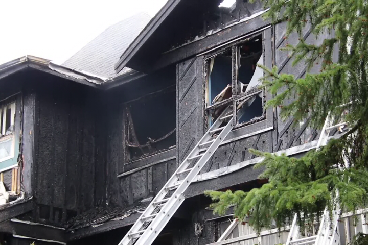 Man arrested over suspicious fire at Surrey townhouse complex